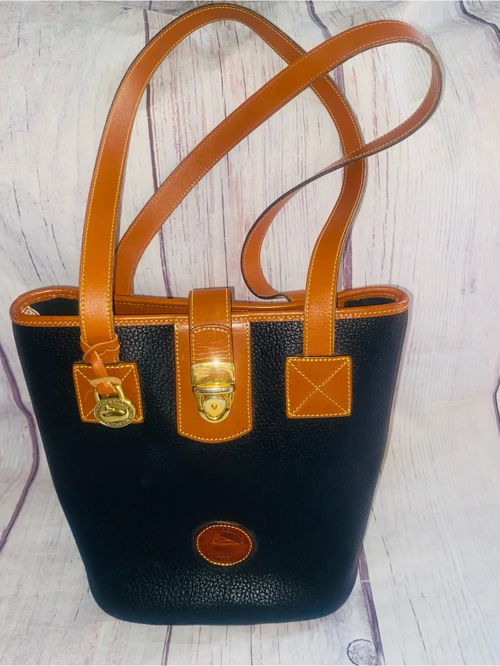 Vtg Dooney Bourke USA AWL Leather Tuck Lock Bucket Tote Shopper Bag Black Tan